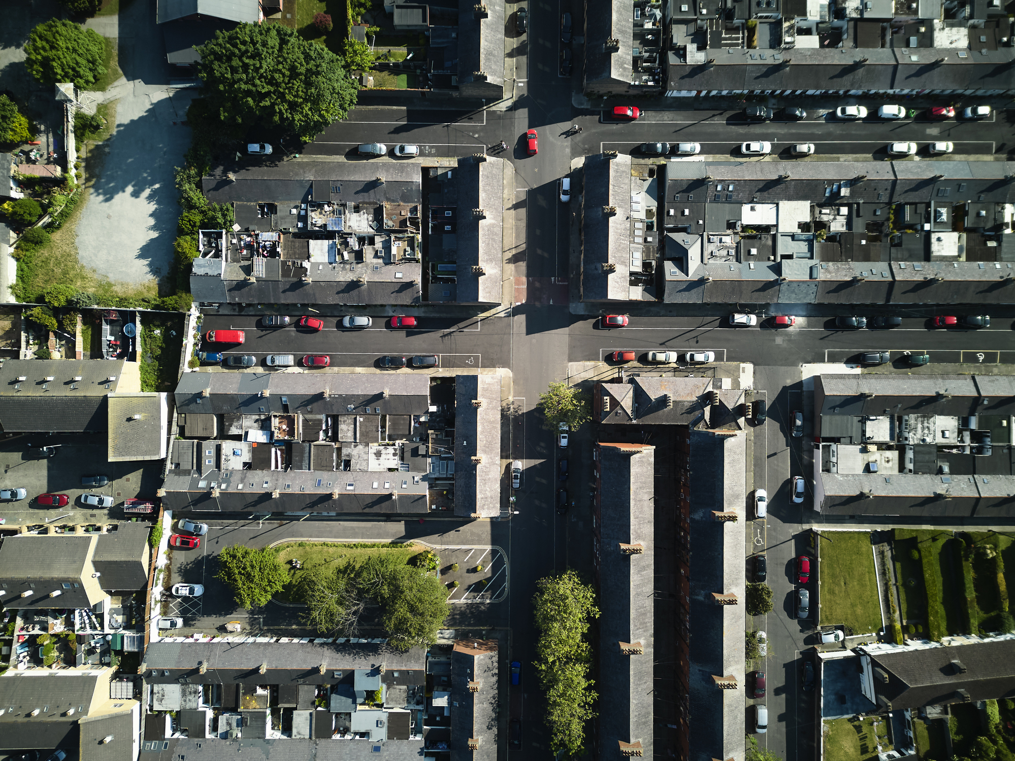 aerial view of neighbourhoods part paved and part with green space