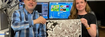 Lead author of the study Melanie Maddin and principal investigator of the group Prof. Juan Diego Rodriguez-Blanco showing an image of a complex texture formed during the synthesis of rare earth carbonate rocks.