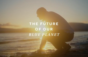 A picture of a man on the beach with text reading: "The Future of our Blue Planet"