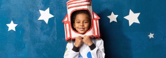 A picture of a child dressed up as an astronaut. 